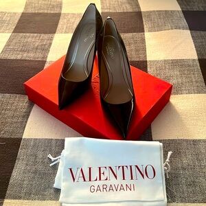 Valentino size 38.  Black patent with silver studs. Worn once for a photo shoot